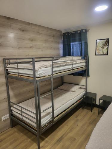 a bunk bed room with two bunk beds in it at Rooms4Rest Bokserska - Private rooms for tourists - ATR Consulting Sp, z o,o, in Warsaw