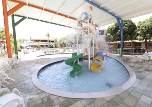 a water park with a slide and a water slide at Caldas Novas DiRoma Fiori in Caldas Novas