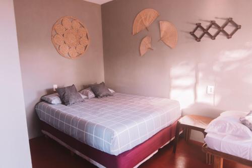 Una cama o camas en una habitación de La Serena Hostel