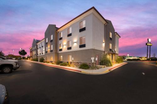 a large white building on the side of a street at Holiday Inn Express Hotel & Suites Limon I-70/Exit 359 by IHG in Limon