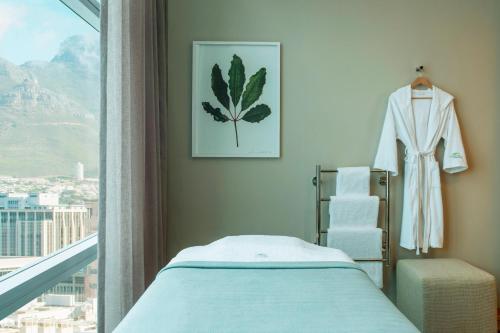 a hotel room with a bed and a window at The Westin Cape Town in Cape Town