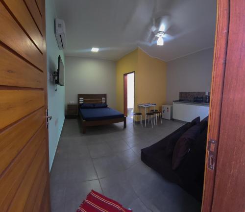 Katil atau katil-katil dalam bilik di Aconchego Flats em Olímpia