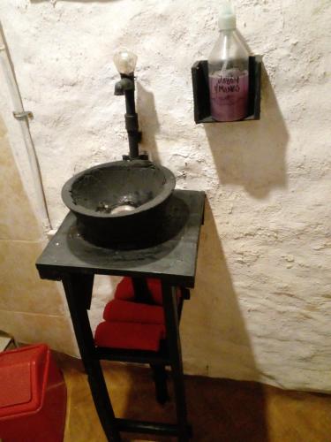 a sink sitting on a table in a room at NUEVA VIDA in Ciudad Lujan de Cuyo