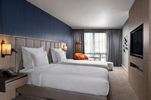 Postel nebo postele na pokoji v ubytování Crowne Plaza Istanbul - Ortakoy Bosphorus by IHG
