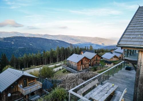 an aerial view of a lodge with mountains in the background at 1A Chalet "Wolke" Wandern, Grillen, Wellness im Traumhaus in Wolfsberg