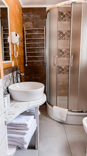 a bathroom with a sink and a shower at Provence in Slavske