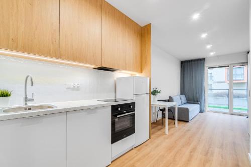 Η κουζίνα ή μικρή κουζίνα στο COMFISTAY Koszyka 45 - Modern suites