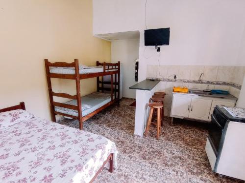 Postel nebo postele na pokoji v ubytování Diva Surf Quartos