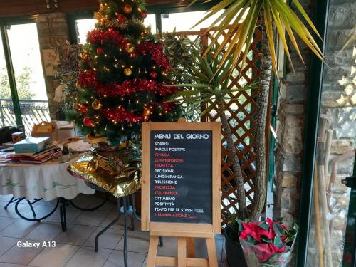 Il Rifugio Di Artemide AGRITURISMOにあるレストランまたは飲食店