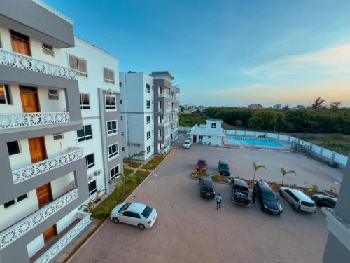 an aerial view of a parking lot in front of buildings at Semo's Siloam apartments in Mombasa