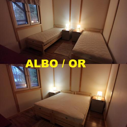 two beds in a room with two lights on them at Biała Dom z widokiem in Biala