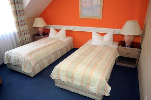 Ліжко або ліжка в номері Ilmenauer Hof