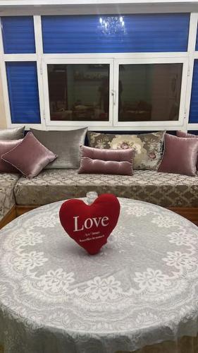 a heart sitting on a table in a room at Agadir Morocco Furnished apartment for long-term rental in Agadir