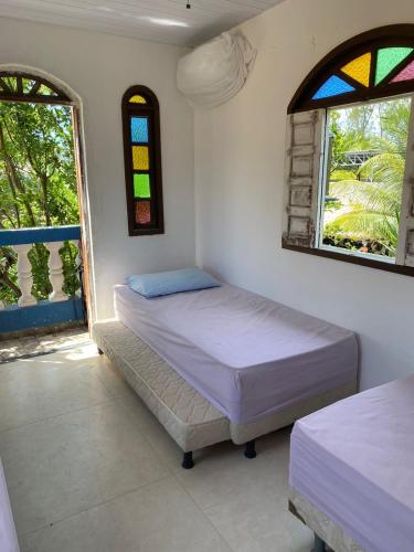 Postel nebo postele na pokoji v ubytování Recanto dos Machados