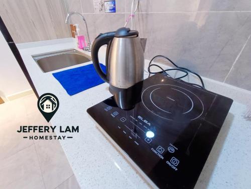 a blender sitting on top of a counter at Imperio Residence Melaka by Jeffery Lam Home Management in Melaka