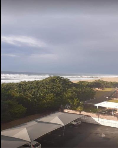 an aerial view of the beach and the ocean at Toti Cabana 58 in Amanzimtoti