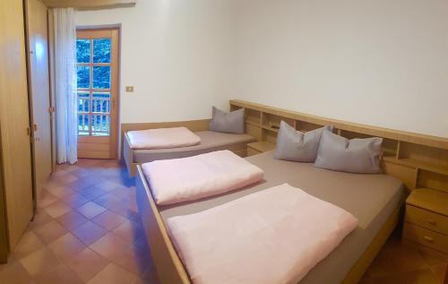 Postel nebo postele na pokoji v ubytování VILLA TERESA