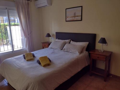 Tempat tidur dalam kamar di Al Andalus Resort