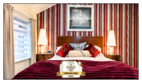 a bedroom with a bed with a trophy on it at Pembroke Bed & Breakfast in Blackpool