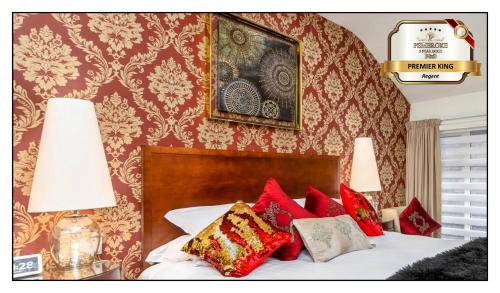 Katil atau katil-katil dalam bilik di Pembroke Hotel