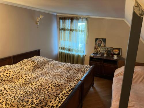 Ένα ή περισσότερα κρεβάτια σε δωμάτιο στο Guest House rent, дом в аренду