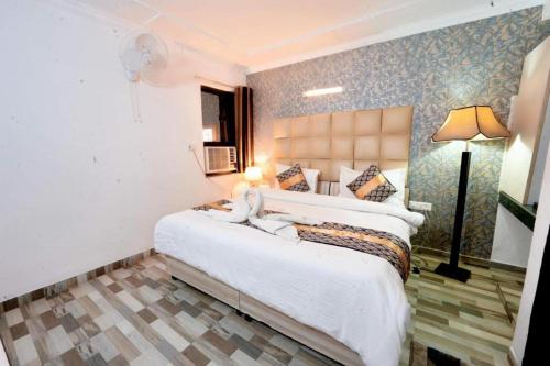 Postel nebo postele na pokoji v ubytování Hotel Clink New Delhi Airport