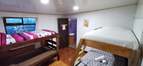 Postel nebo postele na pokoji v ubytování Mora's Place B&B