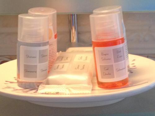 three bottles of medication sitting on a plate at Anvil House in Achill Sound