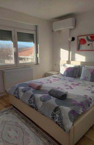 Postel nebo postele na pokoji v ubytování Biljana Apartments