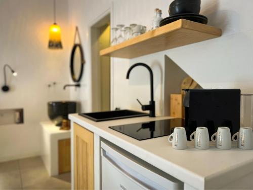 Nhà bếp/bếp nhỏ tại Perigiali Rooms & Apartments Folegandros