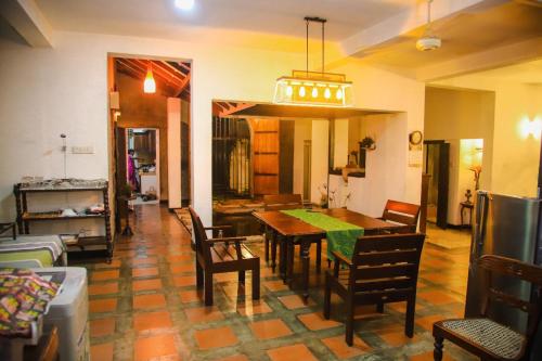 a dining room with a table and chairs at Tranquill Villa La Dimora in Gampaha