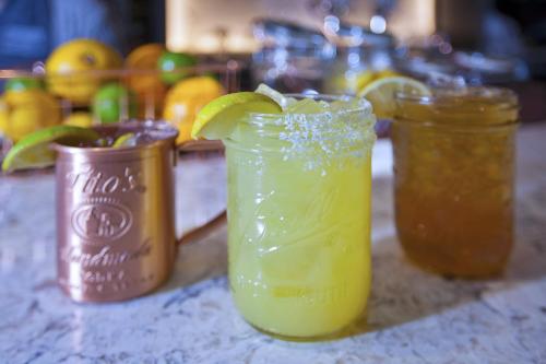 a table with two mason jars with lime slices in them at SpringHill Suites by Marriott Chattanooga North/Ooltewah in Ooltewah