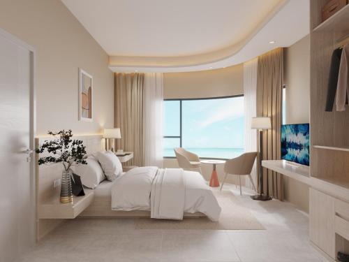 Postel nebo postele na pokoji v ubytování Island Sunset Hotel - Đảo Phú Quý