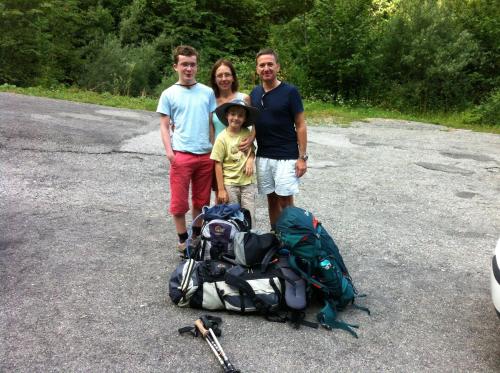 a group of three people standing next to a backpack at Bed & Breakfast Casa Marinella in Lenna