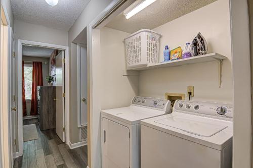 a laundry room with a washer and dryer at Winston Salem Haven Near WFU in Winston-Salem