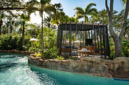 a cage in the middle of a pool in a yard at JW Marriott Orlando Grande Lakes in Orlando