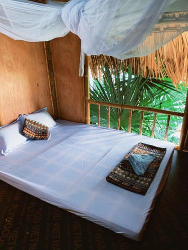 Katil atau katil-katil dalam bilik di Vụ Tịch Lakeview Homestay