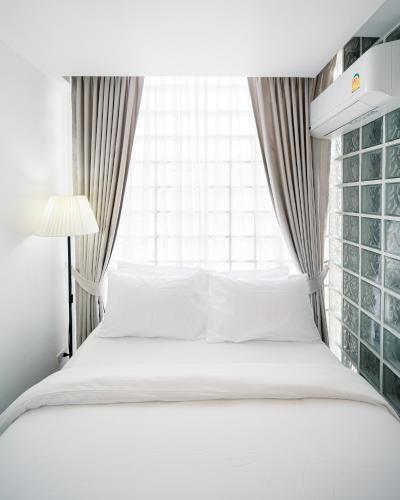 Katil atau katil-katil dalam bilik di Mitt Haus (Lat Phrao Soi 5)