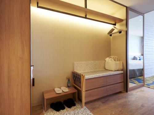Postel nebo postele na pokoji v ubytování Okinawa Prince Hotel Ocean View Ginowan