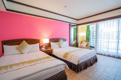 Katil atau katil-katil dalam bilik di Yoho Beach Resort Kenting