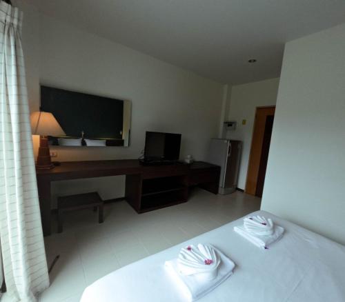 Le Ranong Bistro Hotelにあるベッド