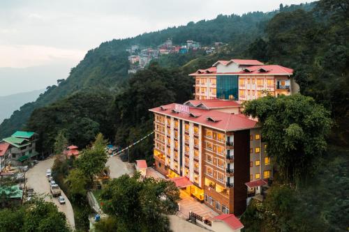 a building on the side of a mountain at Ginger Gangtok in Gangtok