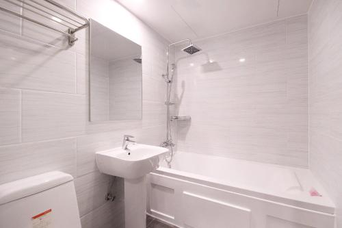 Ванная комната в XYM Hotel Mundeok