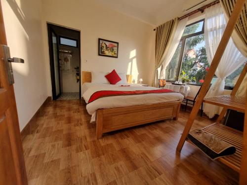 Postel nebo postele na pokoji v ubytování Phi Hung's Unique Homestay