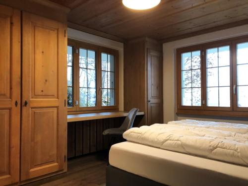 Posteľ alebo postele v izbe v ubytovaní Chalet Acadia