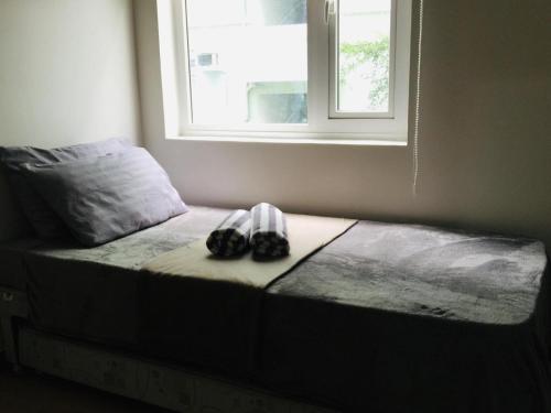 Katil atau katil-katil dalam bilik di Trees Residences Staycation