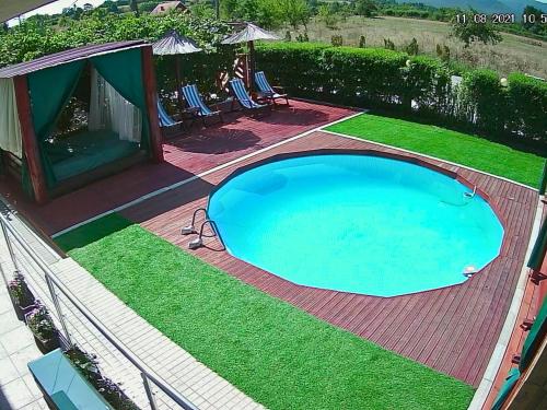 A view of the pool at Villa Saturea or nearby