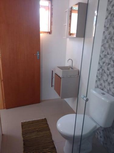 Et badeværelse på aluga-se casa Itapeva torres