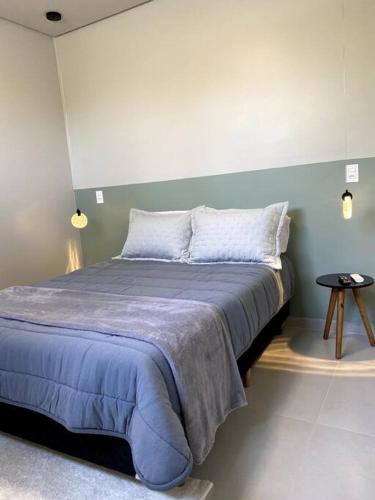 Ένα ή περισσότερα κρεβάτια σε δωμάτιο στο Loft 116 B - Porto Belo/SC