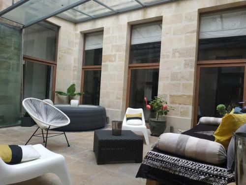 Photo de la galerie de l'établissement Extérieur Chartrons Jardin Public Quais Quinconces XAVIER ARNOZAN, à Bordeaux